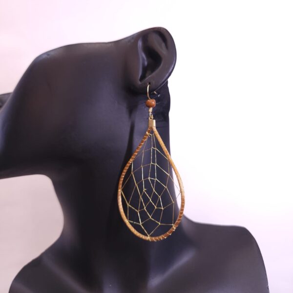 15393989734-whatsapp-image-2025-11-13-at-13-00-24-1.jpeg 0850 - Brinco Capim Dourado