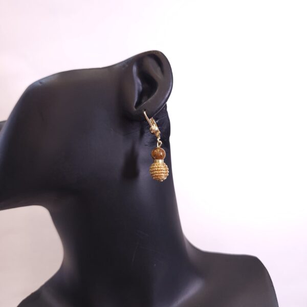 15394006948-whatsapp-image-2025-11-13-at-13-00-28-1.jpeg 0860 - Brinco Capim Dourado